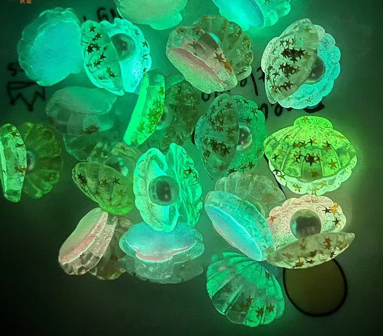 glowing sea shell charms