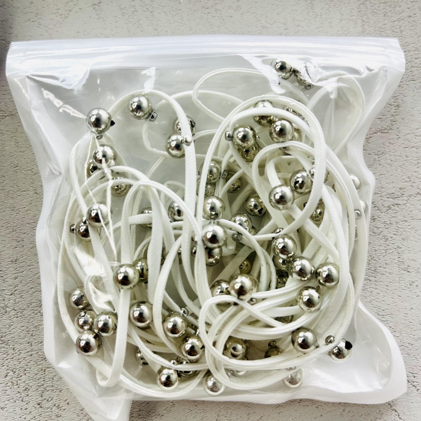 leather with metal balls rope