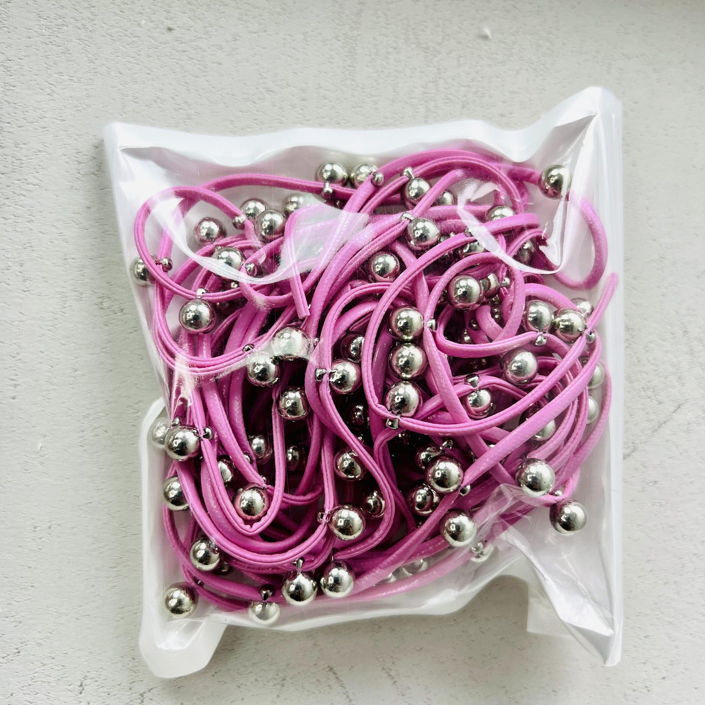 leather with metal balls rope
