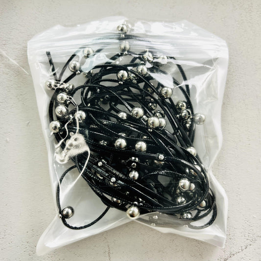 leather with metal balls rope